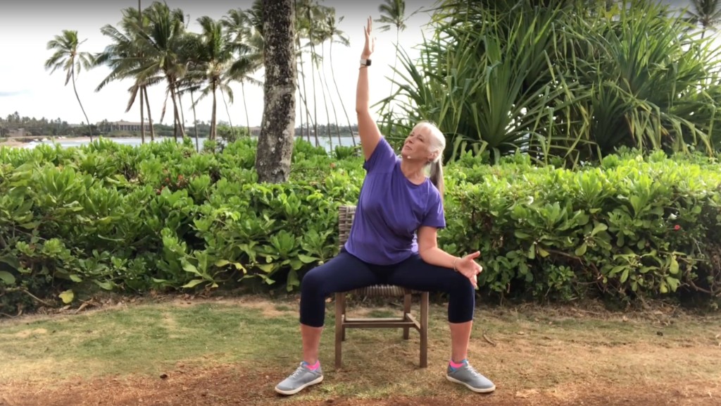 Instructor practicing a movement outdoors
